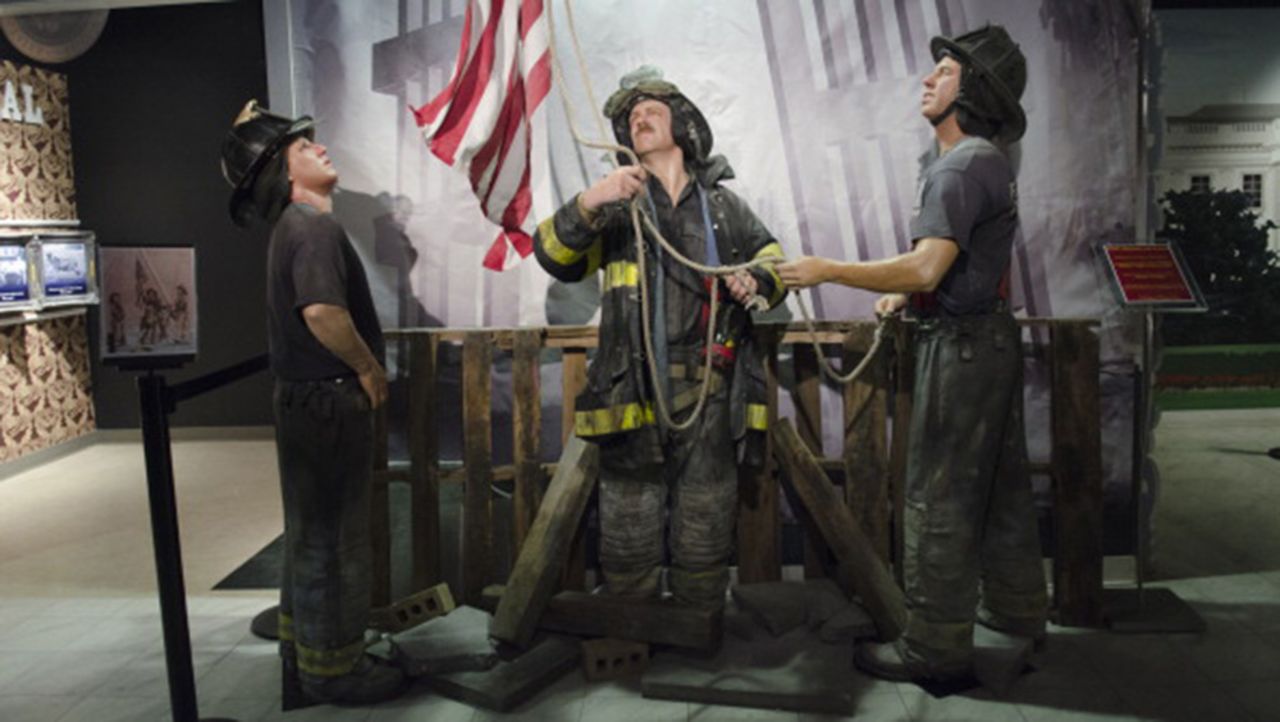 Wax figures of the firefighters are displayed during the "HOPE: Humanity And Heroism" exhibition at Madame Tussauds in Washington on May 10, 2013.
