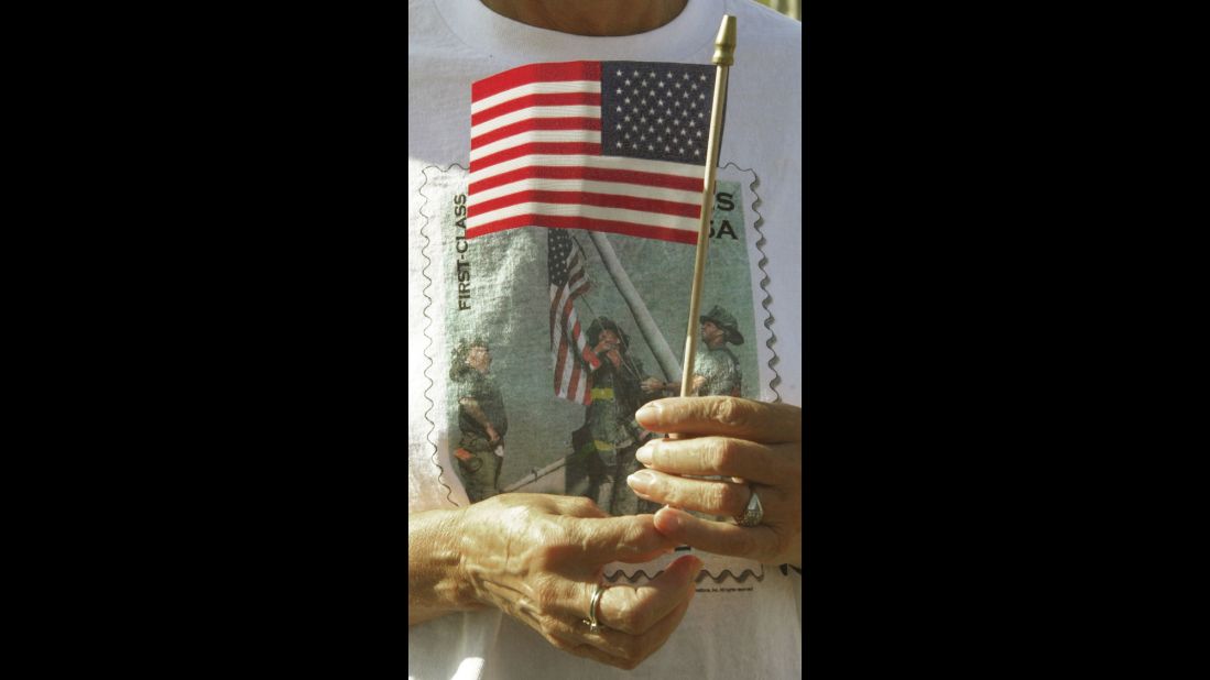 The image can also be found on T-shirts, like this one worn by Venita Bradford at a memorial service in Energy, Illinois, on September 11, 2002.