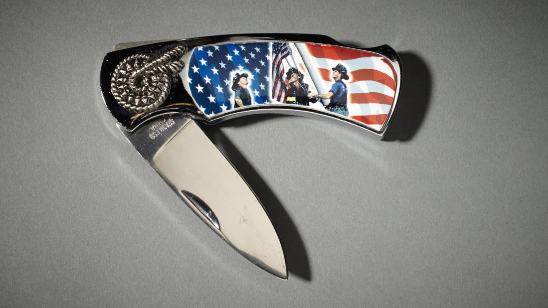 A version of the photograph appears on a commemorative knife. 