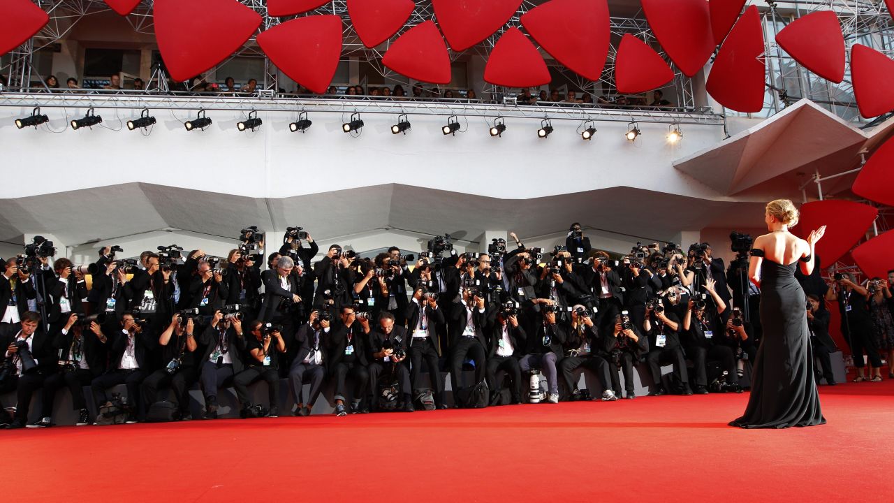 Johansson poses for photographers on the red carpet for the "Under the Skin" screening on September 3.