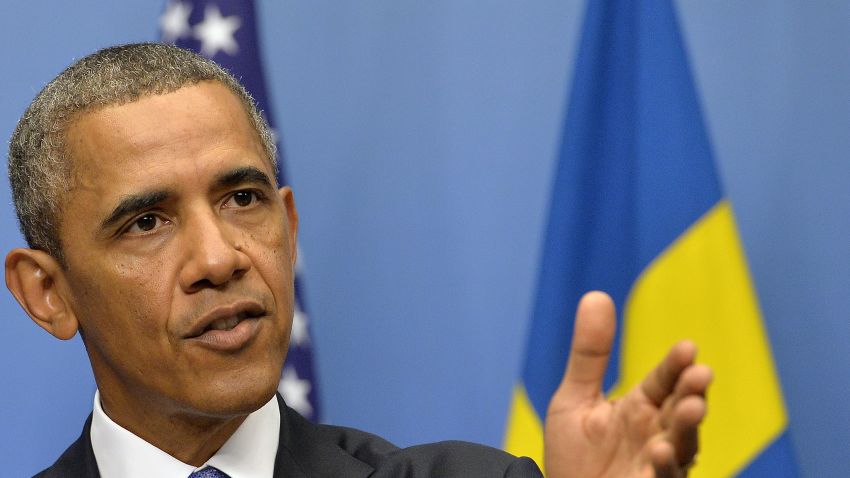 Caption:	 US President Barack Obama answers a question on Syria during a joing press conference with Swedish Prime Minister after their bilateral meeting at the Rosenbad Building in Stockholm on September 4, 2013. Obama met with Fredrik Reinfeldt upon arrival in Sweden on a two-day official trip before leaving for Russia, where he will attend G20 summit. Russia on Thursday hosts the G20 summit hoping to push forward an agenda to stimulate growth but with world leaders distracted by divisions on the prospect of US-led military action in Syria. AFP PHOTO / JEWEL SAMAD (Photo credit should read JEWEL SAMAD/AFP/Getty Images)