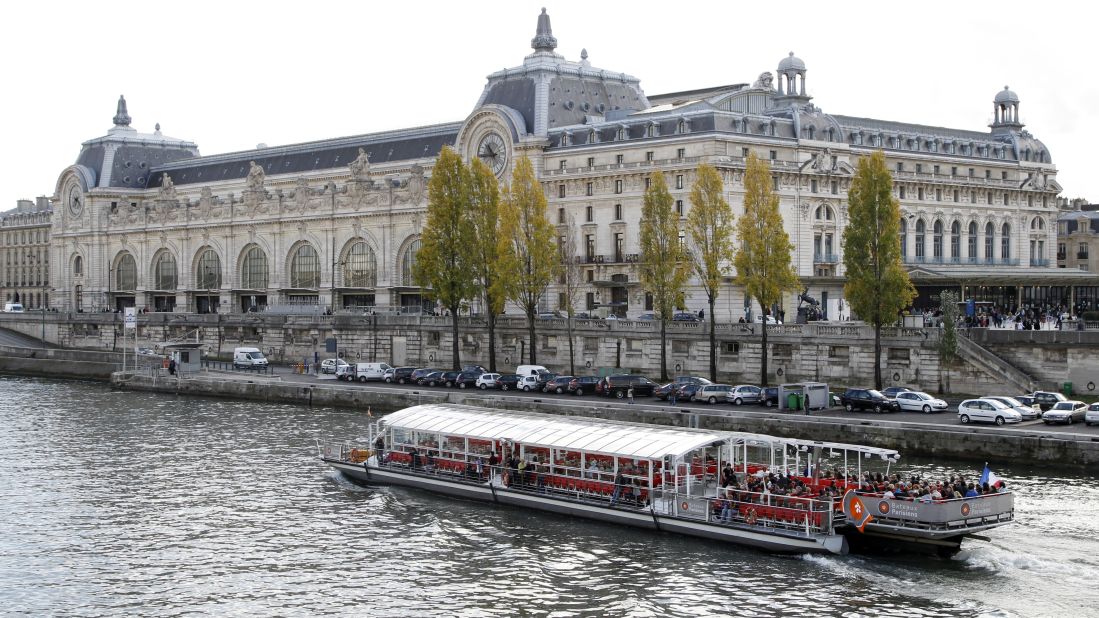 The Musee D'Orsay building is a former Paris train station that displays artwork from 1848 to 1914. It opened in 1986 with collections compiled from three French museums; the Louvre, Musée du Jeu de Paume and the National Museum of Modern Art.