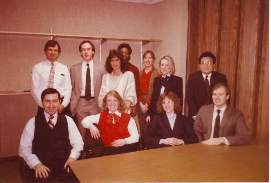 <a href="http://ireport.cnn.com/docs/DOC-1031057">Marjorie Zien</a>, seated second from right, was a computer programmer at the Morgan Guaranty  Trust Company in 1985 and frequently wore skirt-suits to work. She commuted in sneakers and changed into pumps at the office. "It all seems so formal to me. It was as if we were wearing a uniform," said Zien, now 56. 