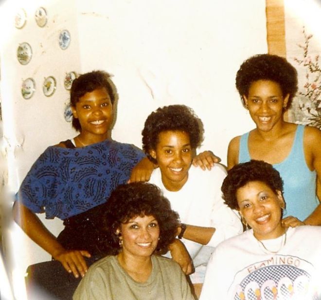 <a href="http://ireport.cnn.com/docs/DOC-1030612">Janee Blackwell Cifuentes</a>, on the left in black and blue, spent her teen years in Wheaton, Illinois. The decade brought many firsts for blacks, she wrote. "Martin Luther King's birthday was made a holiday. Harold Washington was the first black mayor of Chicago. Vanessa Williams was the first black Miss America and that was opening the doors for a lot of black homecoming queens." There were two or three black girls on her high school pom-pom squad. "To me, that was a big deal."