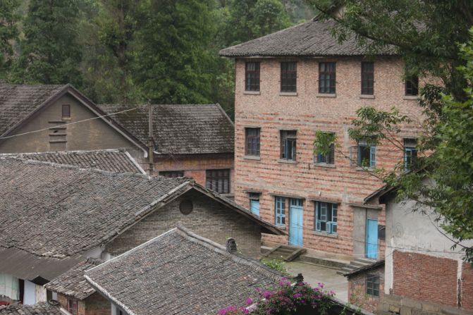 With its empty buildings in terrible conditions, Bagou is a town frozen in time. Tourism may help revive it. 