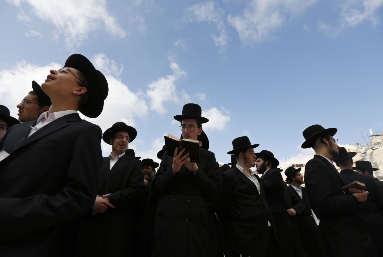 Orthodox Jewish men pray at the Western Wall, Judaism's holiest prayer site, in Jerusalem's Old City on Wednesday, September 4.