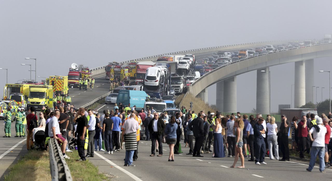 People gather at the scene of the crash. 