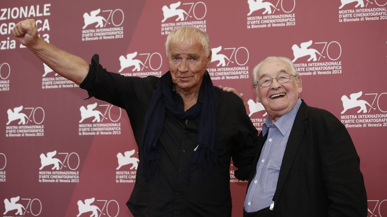 Writer Janusz Glowacki, left, and director Andrzej Wajda pose for photographers during the photo call for the film "Walesa" at the 70th Venice Film Festival on Thursday, September 5. The festival is going on from August 28 through September 7 in Italy.