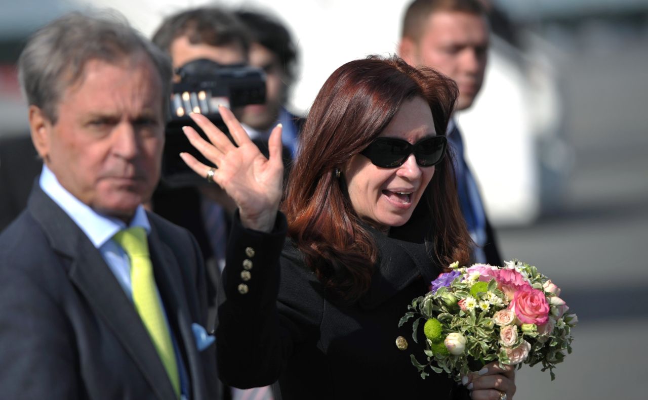 Argentine President Cristina Fernandez de Kirchner waves as she arrives in St. Petersburg on September 4.