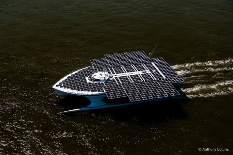 Featuring an expandable deck covered in over 500 square meters of solar panels, the 60-ton vessel is completely powered by the sun. More than 800 solar panels charge enormous lithium-ion batteries stowed in the catamaran's twin hulls -- which power two electric motors at the back. 