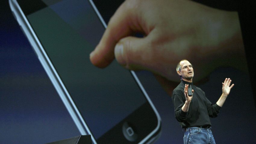 Apple chief executive Steve Jobs unveils a new mobile phone that can also be used as a digital music player and a camera, a long-anticipated device dubbed an "iPhone." at the Macworld Conference 09 January, 2007 in San Francisco, California. The iPhone will be ultra-slim -- less than half-an-inch (1.3 centimeters) thick -- boasting a phone, Internet capability and an MP3 player as well as featuring a two megapixel digital camera, Jobs said.