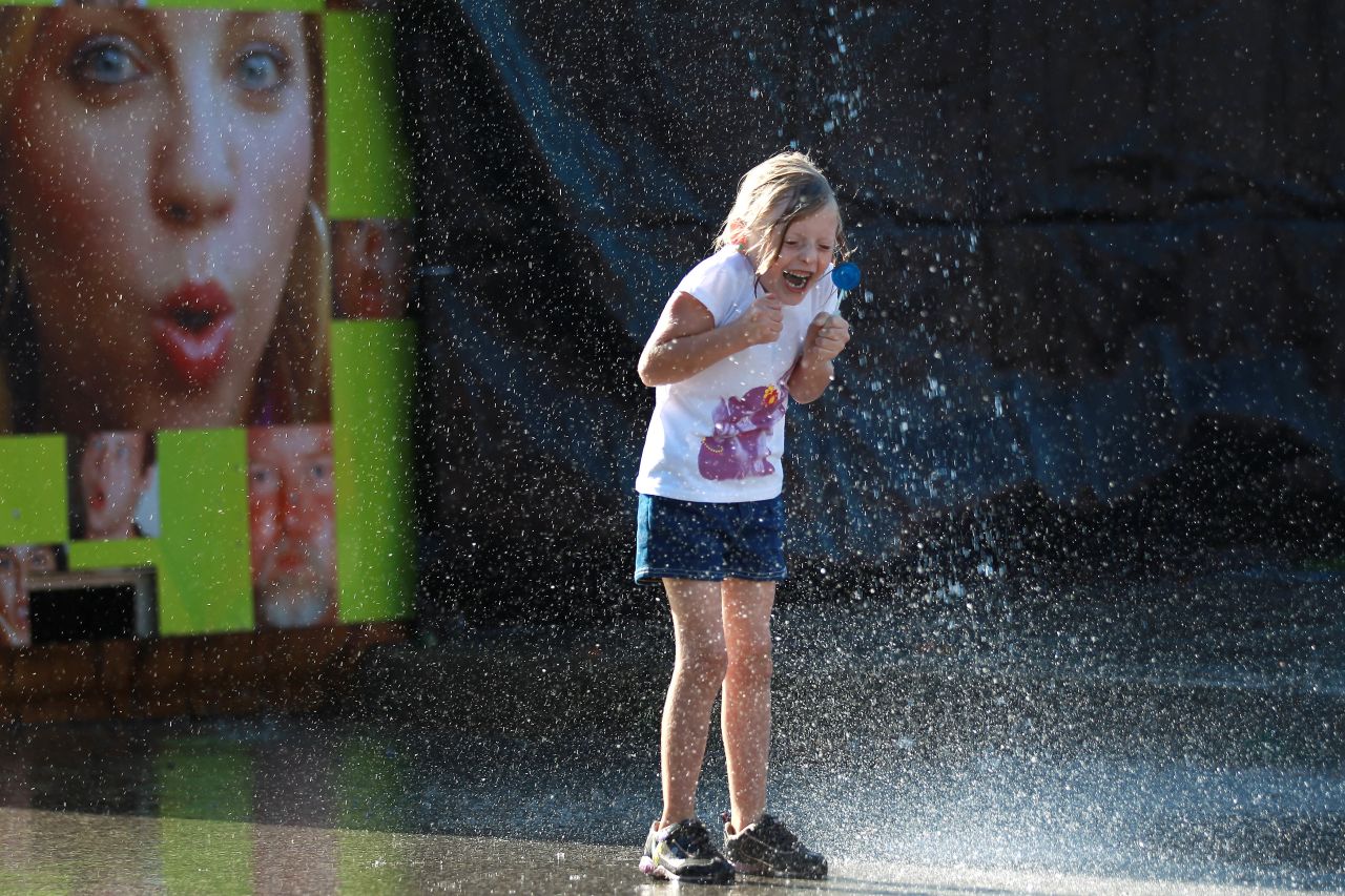Alexis Rowberry plays in cold water during the final day of the Canadian National Exhibition in Toronto on September 2.     