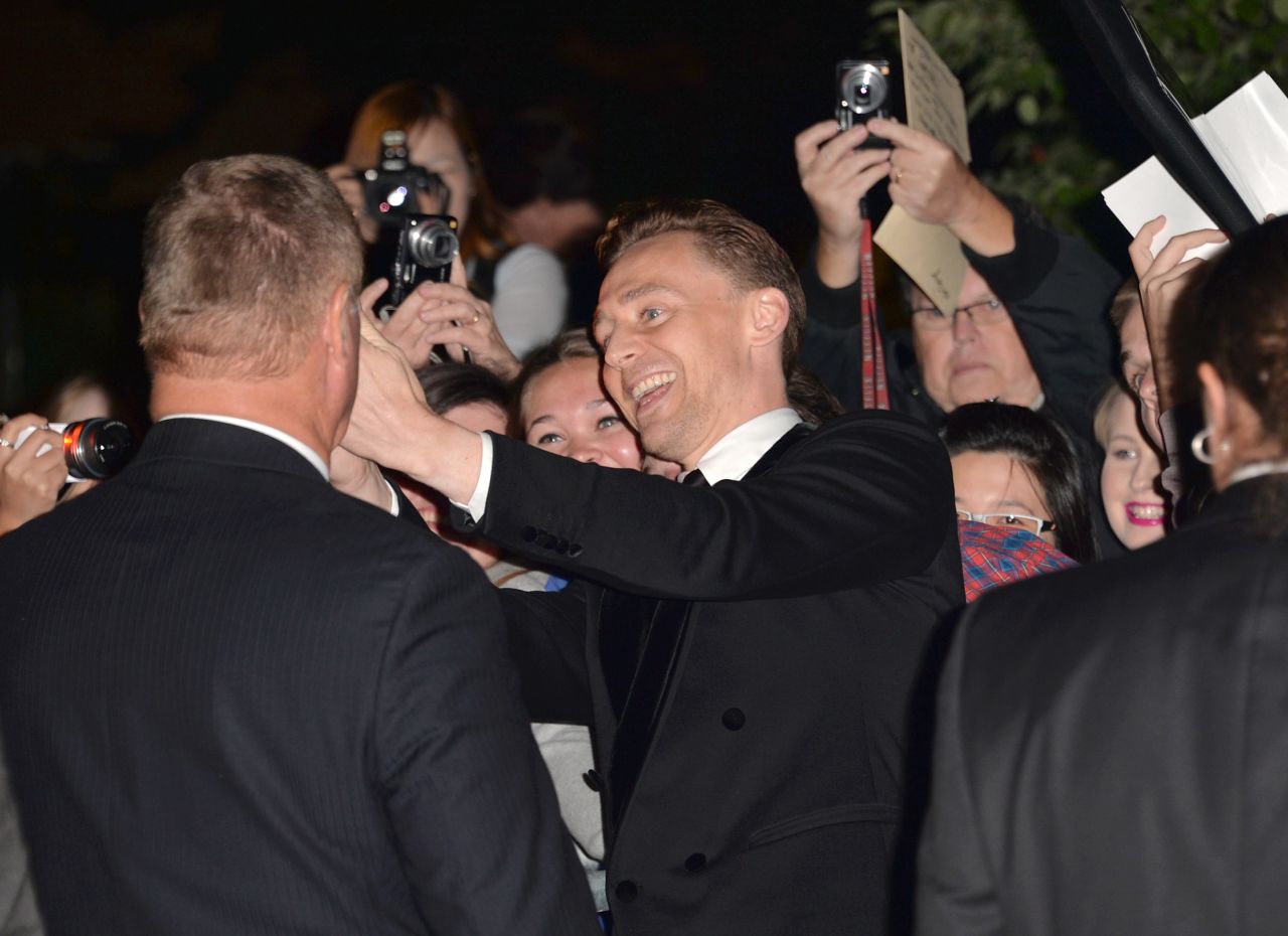 Actor Tom Hiddleston greets fans at the "Only Lovers Left Alive" premiere at the Ryerson Theatre on September 5.
