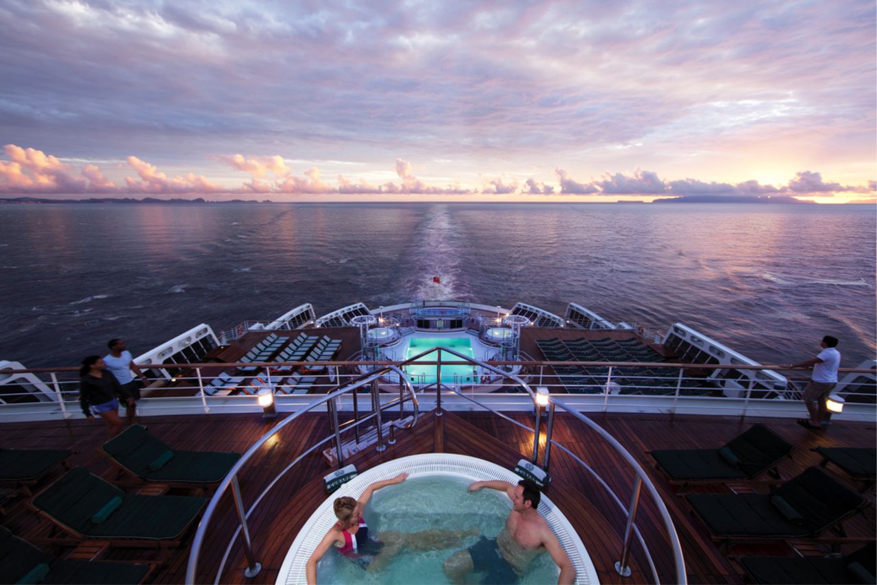 "To the planetarium or the ballroom after sunset cocktails?" The <em>Queen Mary 2</em> makes a stylish nine-day cruise from New York to Hamburg, Germany. In 2004, it became the first transatlantic passenger liner built in 35 years.