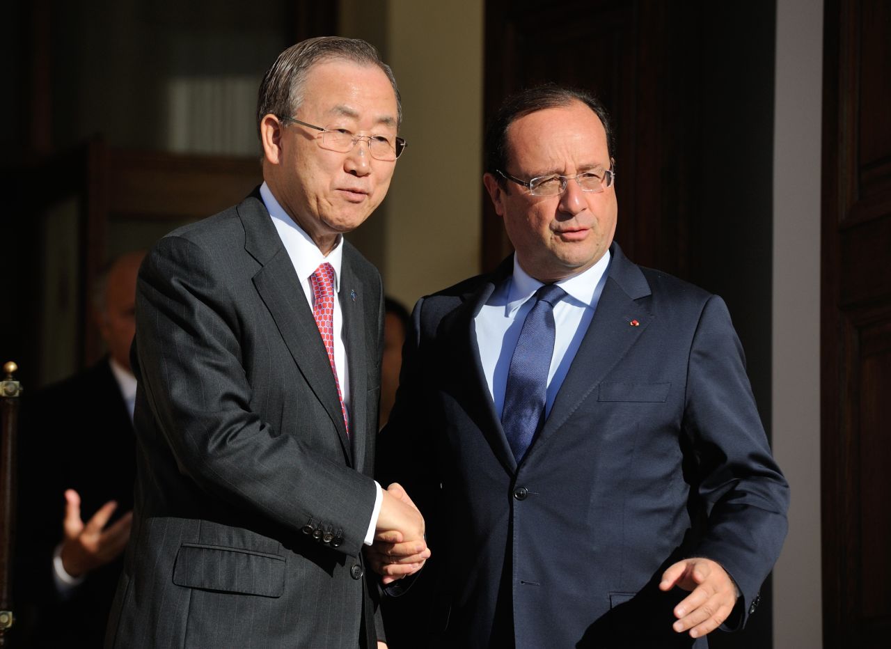 UN Secretary General Ban Ki-moon, left, and French President Francois Hollande pose after a bilateral meeting in the sidelines of the G-20 summit on September 6.