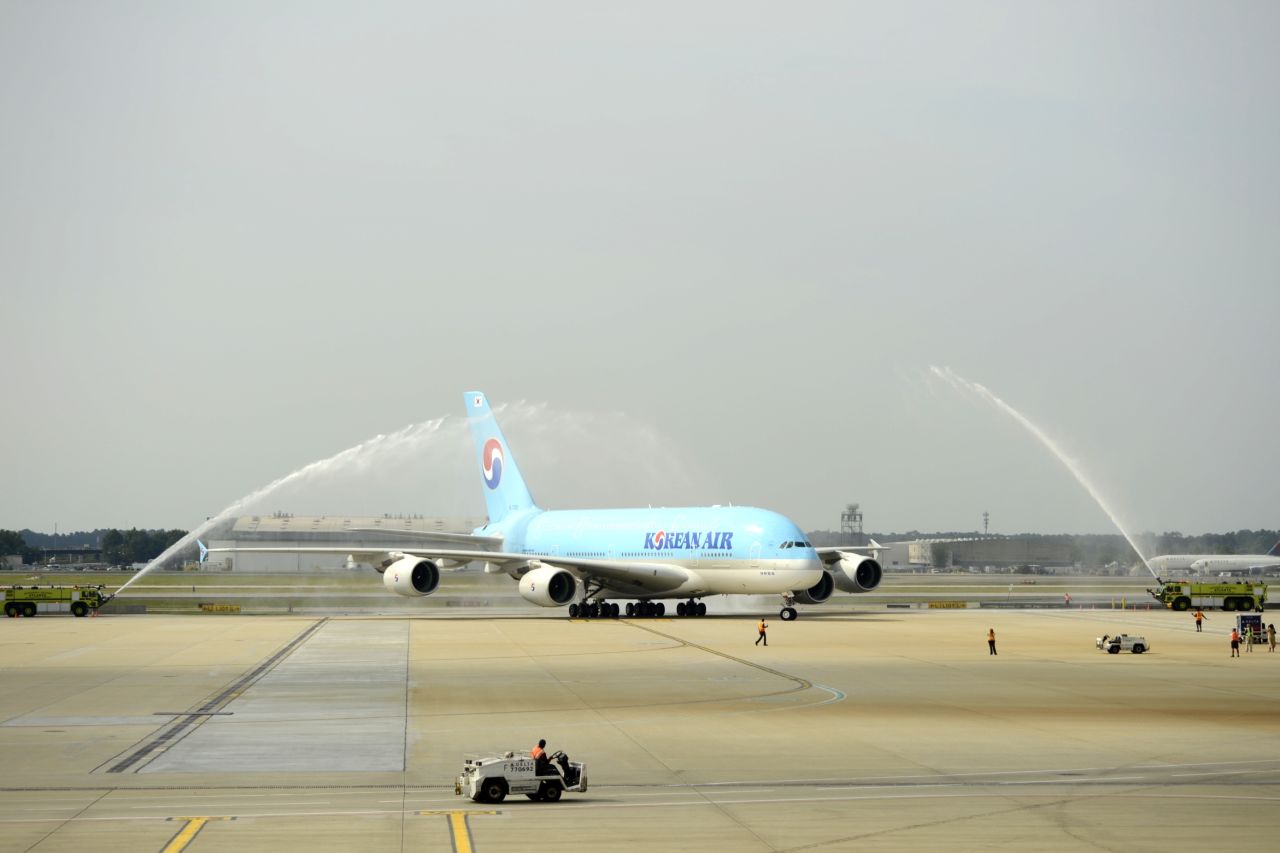 An Airbus A380 flown by Korean Airlines arrives at Hartsfield-Jackson Atlanta International Airport on Friday to a spectacular water cannon salute. The airport held a ceremony to welcome the world's largest airliner, which began nonstop service between Atlanta and Seoul this week. 