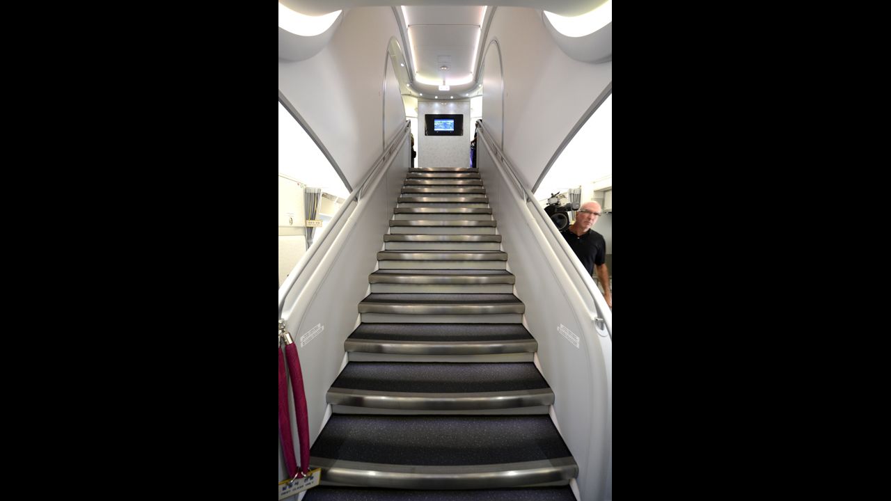 The A380 is the only airliner with double-decker floors from front to back. Passengers take this stairway near the front of the aircraft to the business class section on level two.