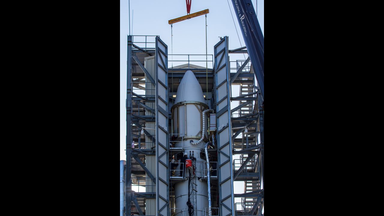 The moon orbiter sits in the nose-cone at the top of the Minotaur V rocket, a ballistic missile converted into a space launch vehicle.