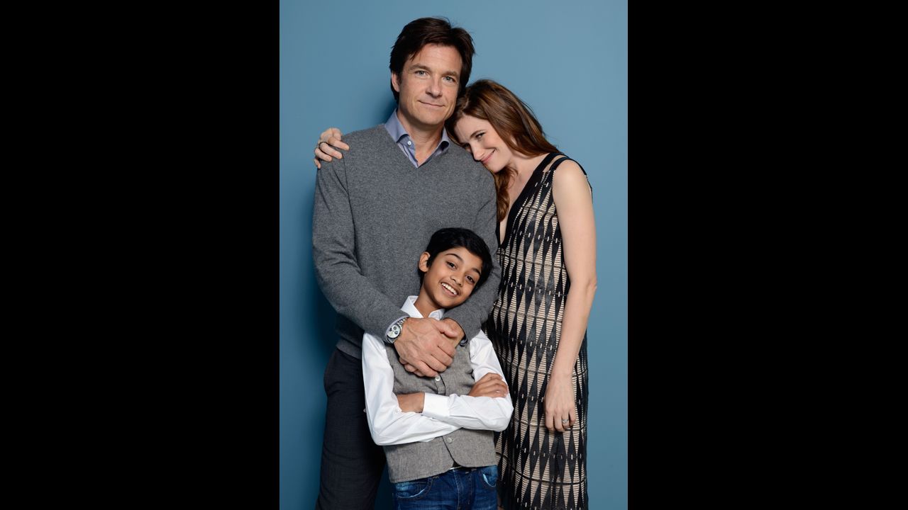 Actor/director Jason Bateman, actor Rohan Chand and actress Kathryn Hahn of "Bad Words" pose at the Guess Portrait Studio on September 6.