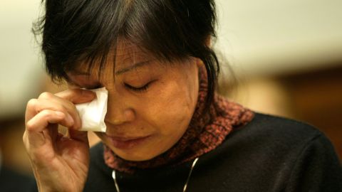 Gao Qin Sheng, Shi Tao's mother, cries during the U.S. hearing in Washington on November 6, 2007.