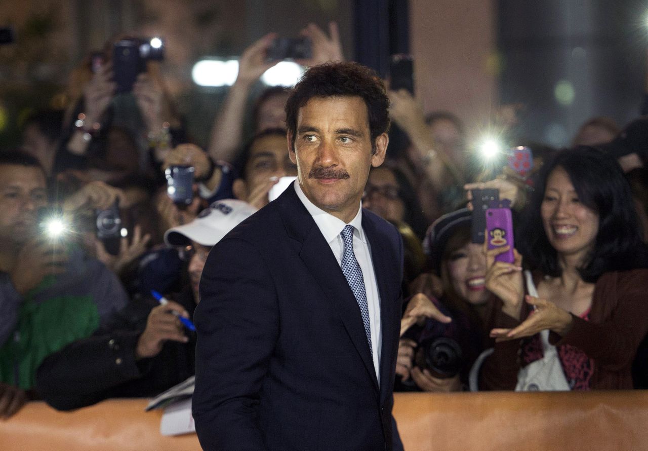 Actor Clive Owen arrives for the screening of the movie "Words and Pictures" on September 7.