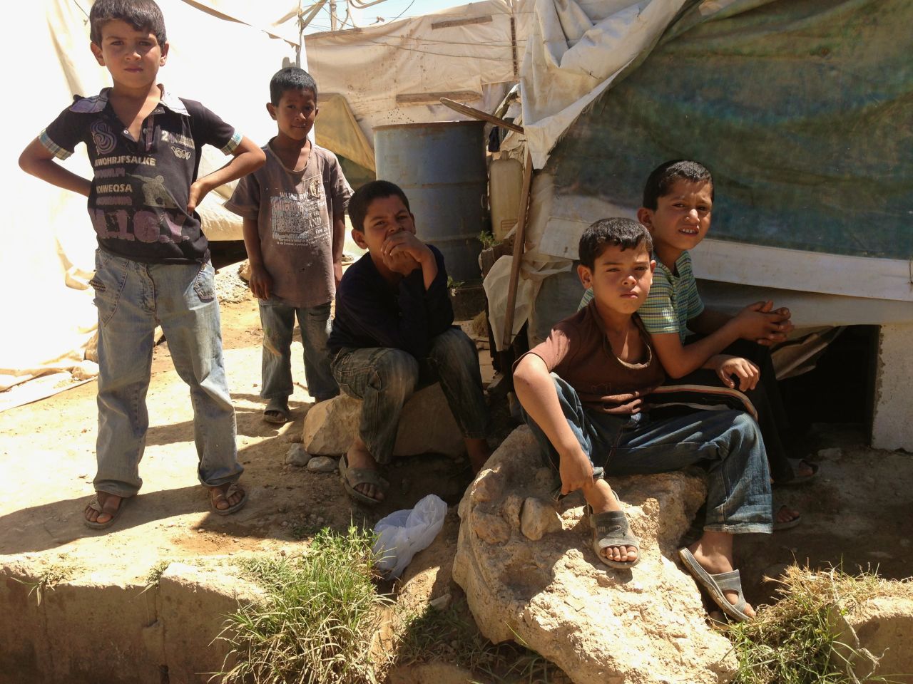 More than a million Syrian children were forced to leave their homes and move into refugee camps like this one, located in Zahle, Lebanon. Many of the child refugees are put to work on farms nearby, where they earn just $2 a day.