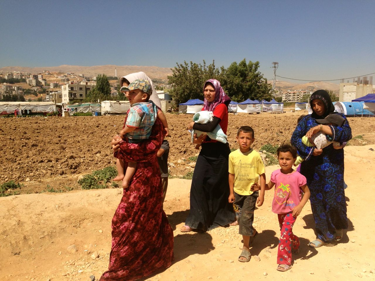 Families seeking refuge in Lebanon are faced with the challenge of not being wanted. The government does not sanction any official refugee camps or assist with fixed water facilities or sanitation systems in camps. Refugees tell CNN they want to go home, back to Syria, but are afraid for the safety of their families.
