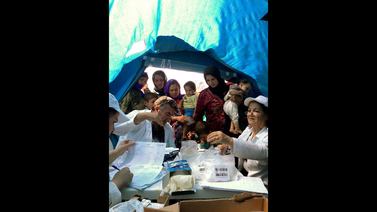 Refugees line up for a free doctor checkup at a camp half a mile from the Syria border. The children here live in filthy conditions. No surprise, the doctors from this UNICEF mobile clinic say they treat hundreds of kids a day for lice, scabies, malnutrition and respiratory infections.