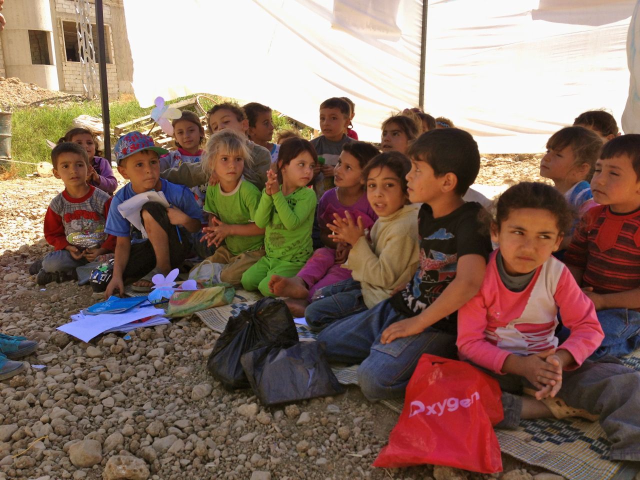 Forced from the comforts of their homes, into often filthy refugee settlements in Bekaa Valley, Lebanon, these Syrian children are a lesson in resilience.