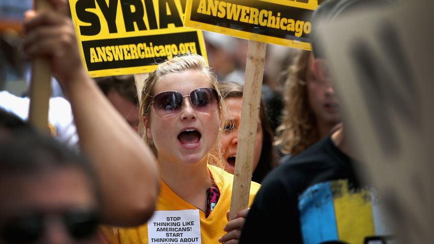CHICAGO, IL - SEPTEMBER 07: Protestors demonstrate against U.S. intervention in Syria on September 7, 2013 in Chicago, Illinois. President Barack Obama has sought congressional approval to attack Syria in response to allegations that the Syrian regime had used chemical weapons on their own people. (Photo by Scott Olson/Getty Images)