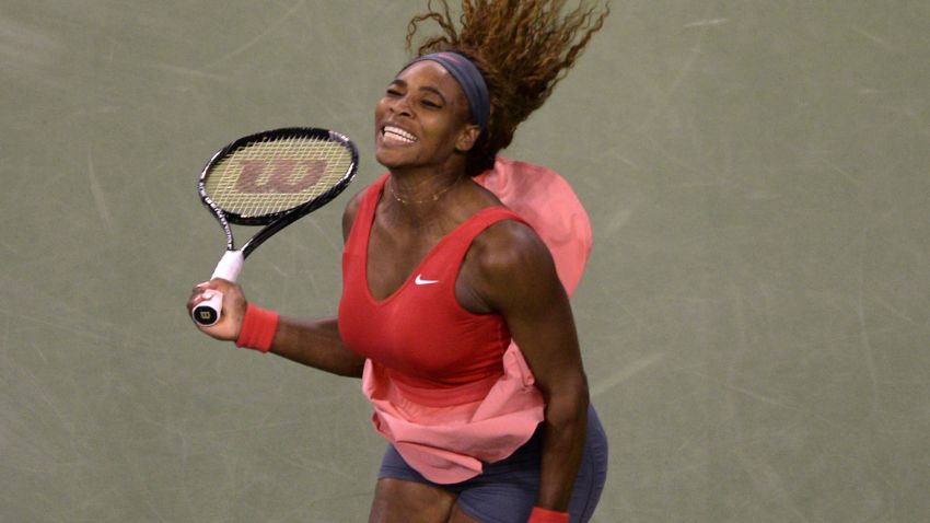 Serena Williams jumps for joy after clinching her fifth U.S. Open title with a three set win over Victoria Azarenka.