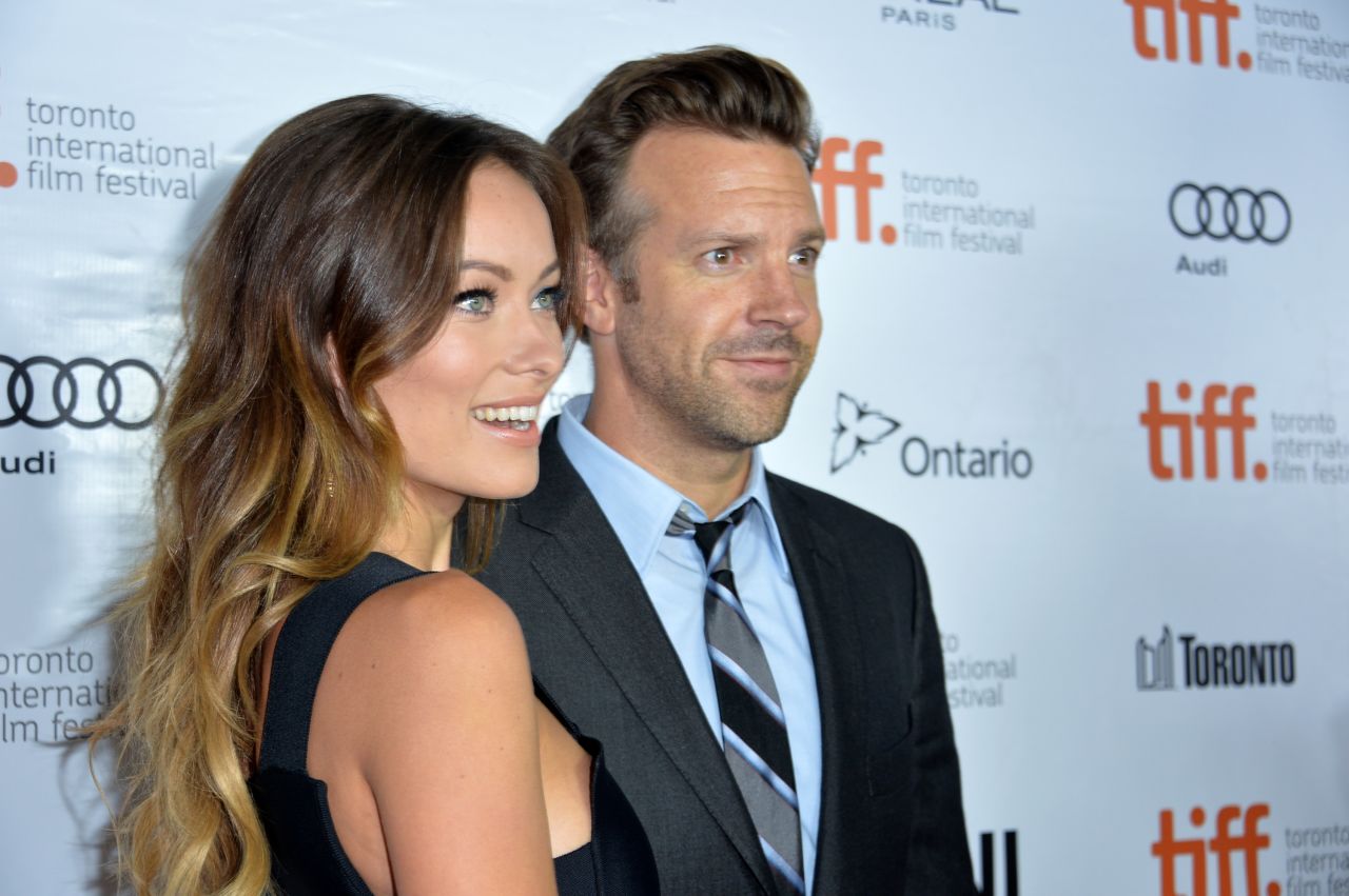 Actors Olivia Wilde and Jason Sudeikis attend the "Rush" premiere on September 8.