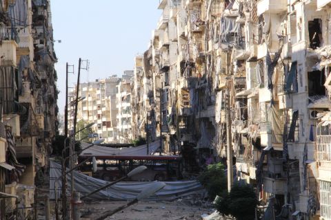 Buildings are heavily damaged in the Salah al-Din area of Aleppo on September 8. 