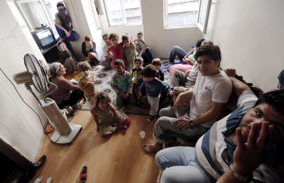 A Syrian refugee family of 26 people shares one room in the Eminonu district of Istanbul in September 2013.