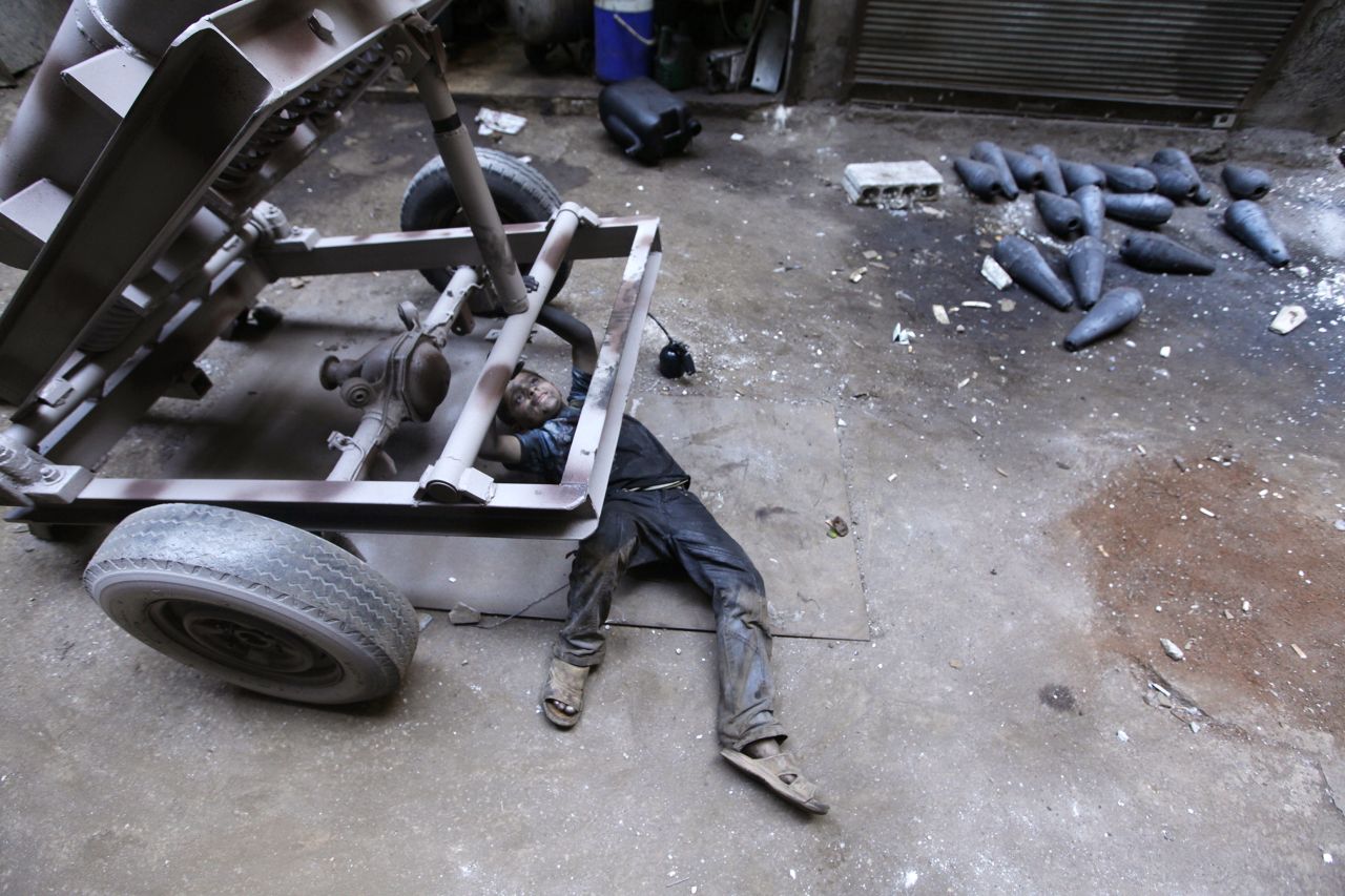 Issa fixes a mortar launcher.