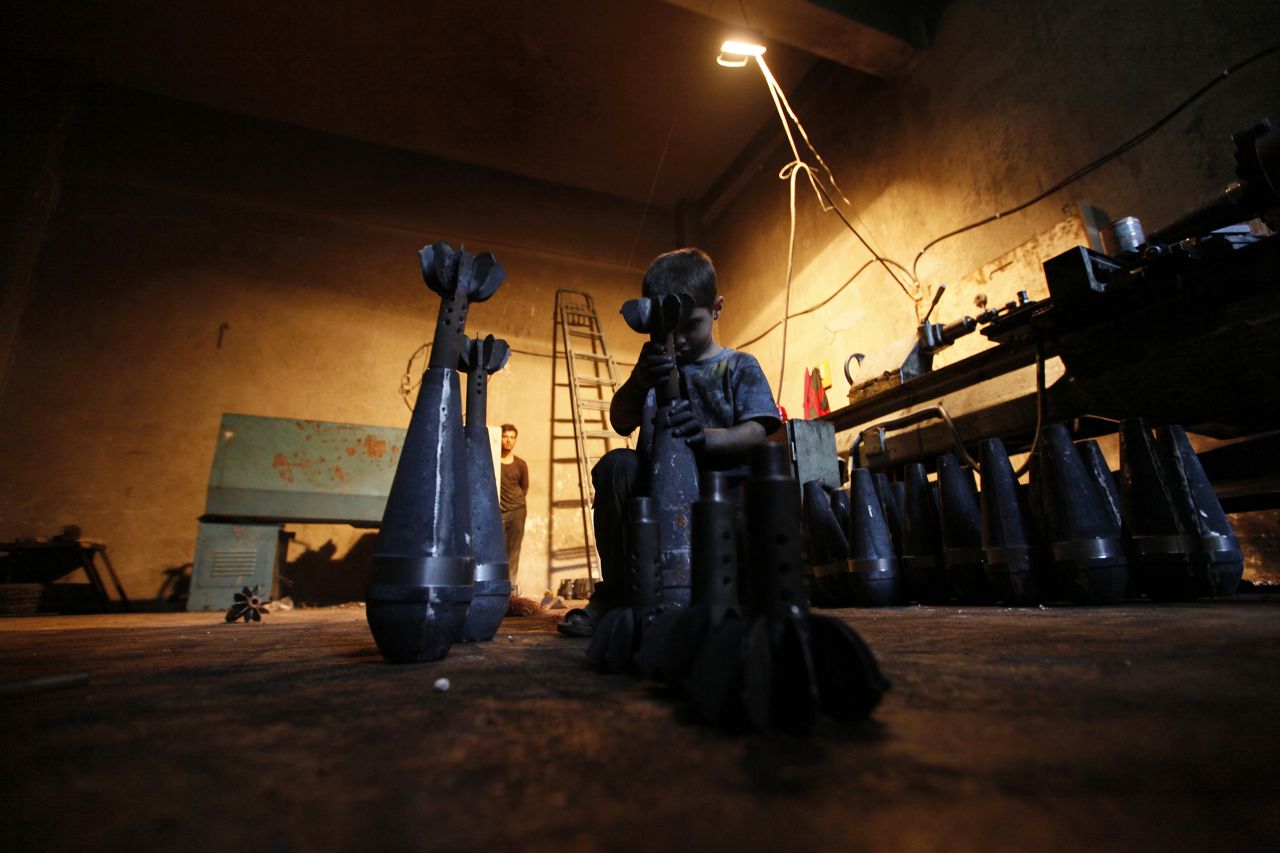 Issa assembles a mortar shell that is locally made.