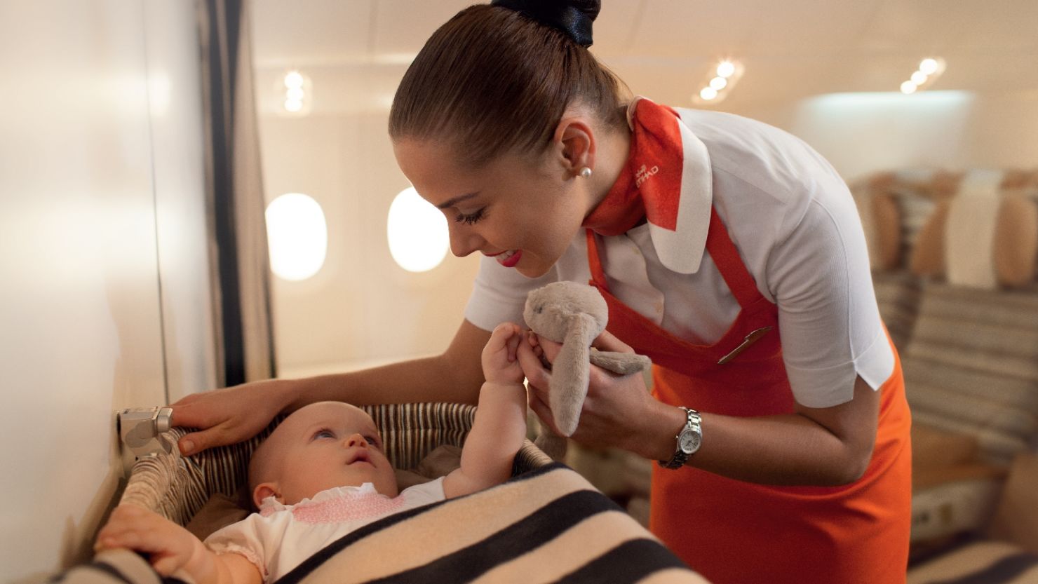 Etihad Airways trained crew members to be in-flight nannies to young passengers.