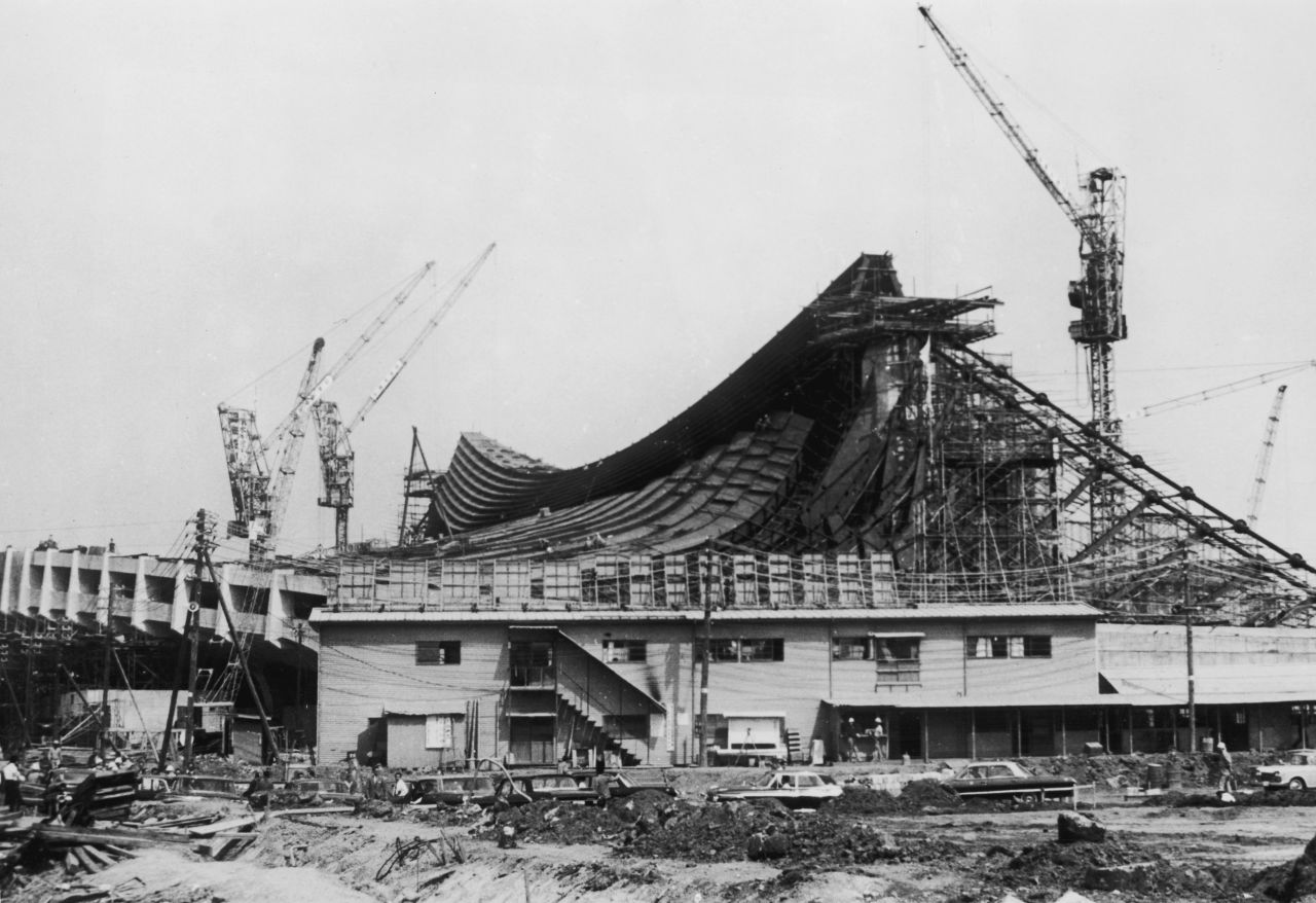 The construction of the National Gymnasium of the Olympic Village at Yoyogi in Tokyo, where the athletes lived for the duration of the Games, pictured on June 6, 1964. 