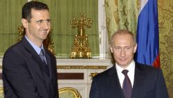 MOSCOW, RUSSIAN FEDERATION: Russian President Vladimir Putin (R) shakes hands with his Syrian counterpart Bashar al-Assad during their meeting in Moscow, 25 January 2005.