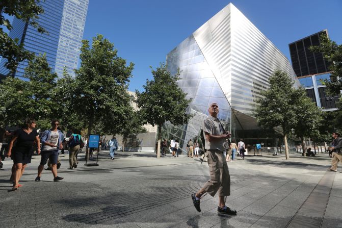 A visitor to the National September 11 Memorial & Museum takes in the sight.