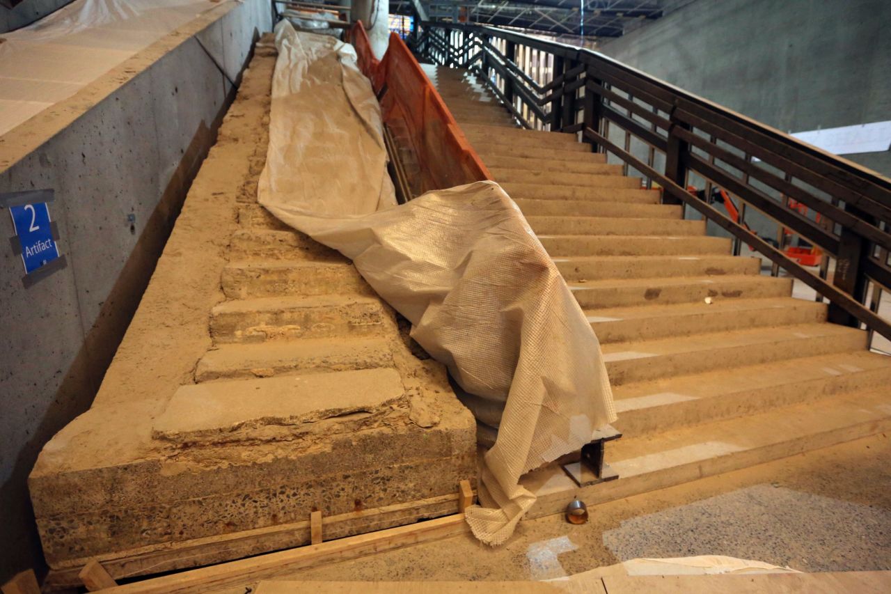 The original stairway from the World Trade Center Plaza to Vesey Street, left, is seen at the museum.