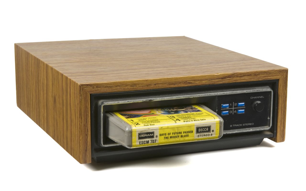 For more than a decade, the cassette's chief competition in the portable tape market was the 8-track cartridge, invented in 1964. Eight-tracks were divided into four programs, each with two-track stereo (hence 8 tracks). Automobile manufacturers adopted the 8-track quickly, but the format had its flaws -- it wasn't rewindable and the programs sometimes split songs in two. By the late '70s, the cassette had won the tape war.