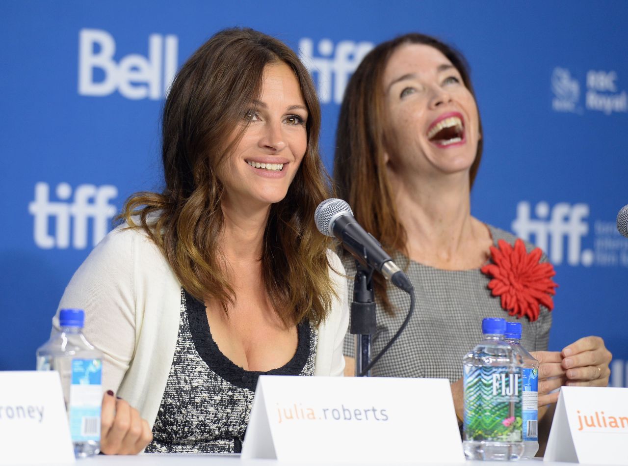 Julia Roberts, left, and Julianne Nicholson face the media at a press conference for their movie "August: Osage County" on Tuesday, September 10.