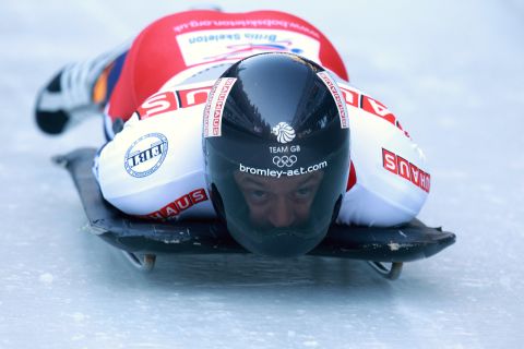 Skeleton racers tackle the ice on their sleds with their head just barely a few centimetres ahead of the sheet ice, using their bodies to steer at high speeds.