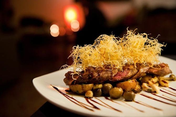 Phnom Penh is gaining a reputation for fine dining. The menu at popular Tepui at China House is influenced by Mediterranean and South American cuisine. Head chef Gisela Salazar Golding is Venezuelan. Pictured: duck breast in a bed of mushrooms with baby potatoes.  