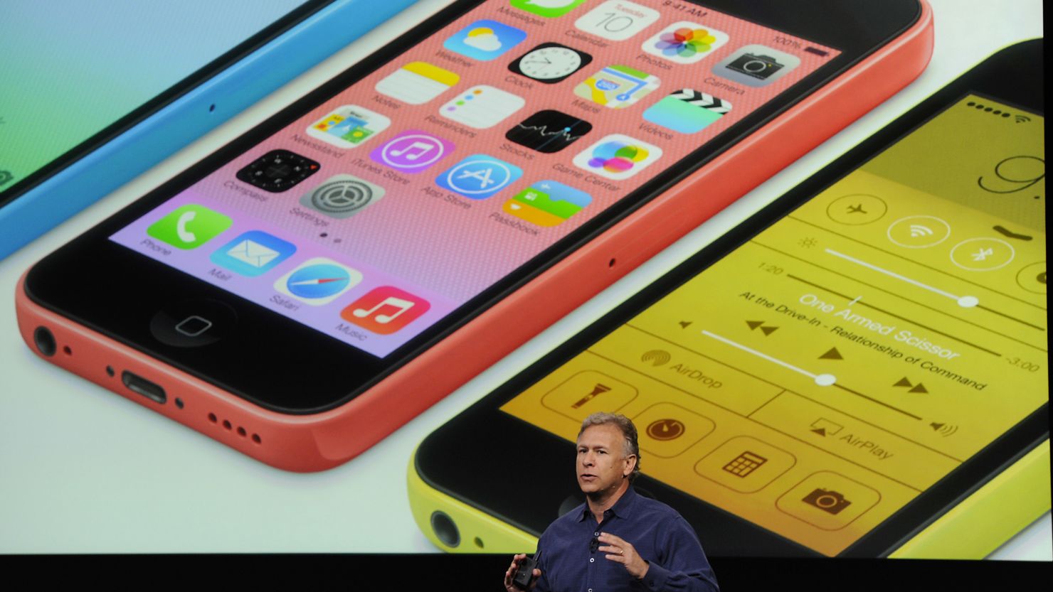 Apple's Phil Schiller presents the iPhone 5C, a cheaper, simpler version of the phone, at a September event.
