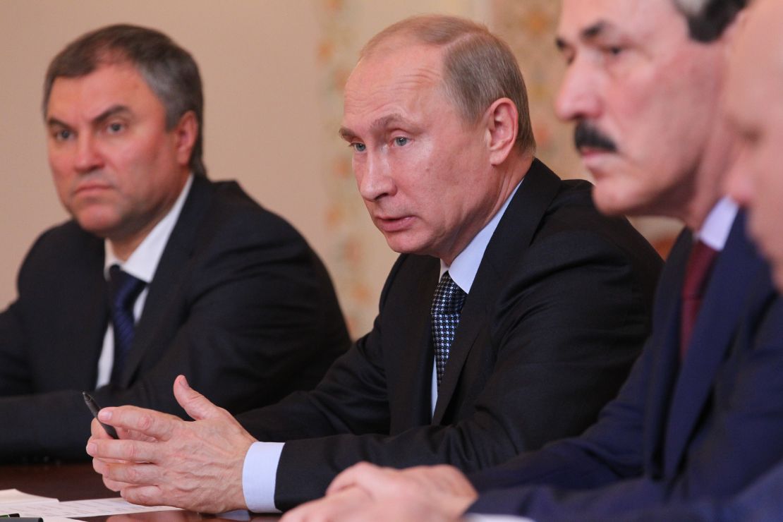 Russian President Vladimir Putin speaks as his Depyuty Chief of Staff Vyacheslav Volodin (left) looks on during a meeting in 2013.
