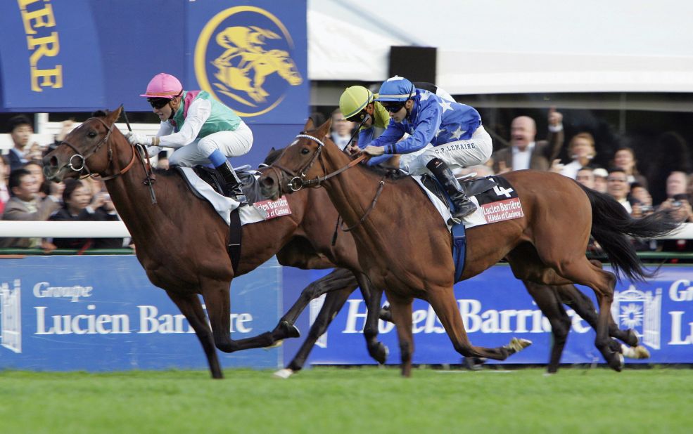 One of the nation's most famous horses is Deep Impact (center), ridden by Take, which came within a whisker of winning the Prix de l'Arc de Triomphe in 2006 -- when Britain's Rail Link snatched the race honors.