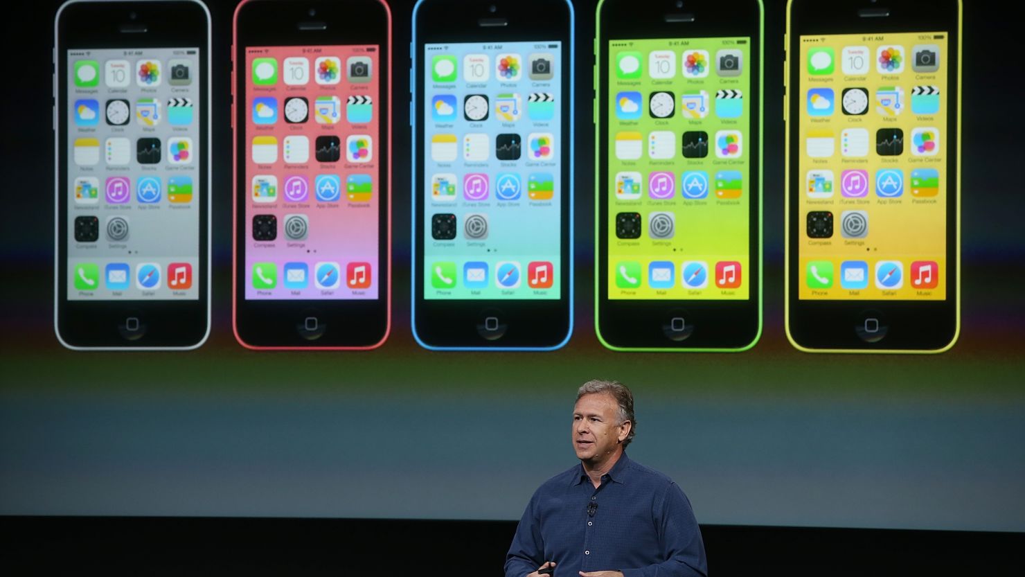 Phil Schiller, Apple senior vice president of worldwide marketing, touts the new iPhone 5C last week at Apple headquarters.