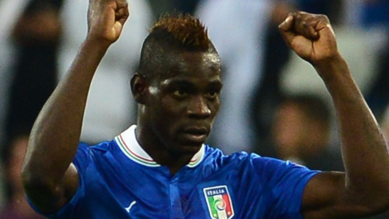 Maria Balotelli celebrates after scoring his crucial penalty in the 2-1 win over the Czech Republic.